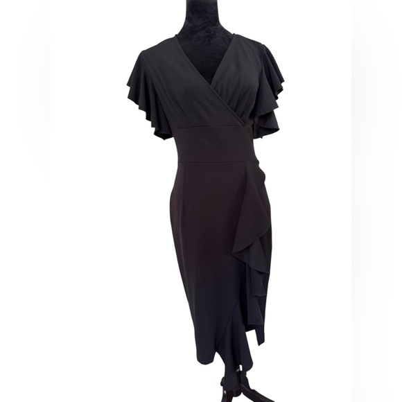 Surplice Ruffled Cap Sleeve Dress by Knitee
Size 8/10 - Picture 1 of 9